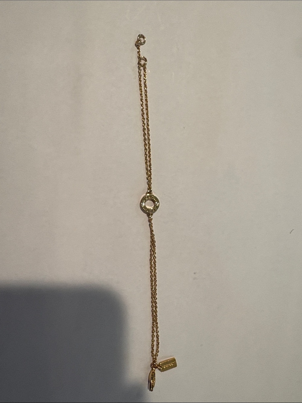 Coach Delicate Gold-Tone Circle Pendant Bracelet